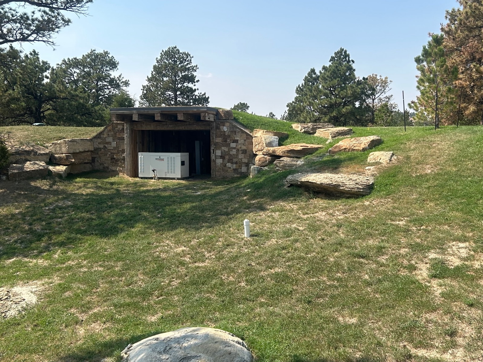 Quarter Circle 7 Ranch — stone shelter and boulder retaining walls